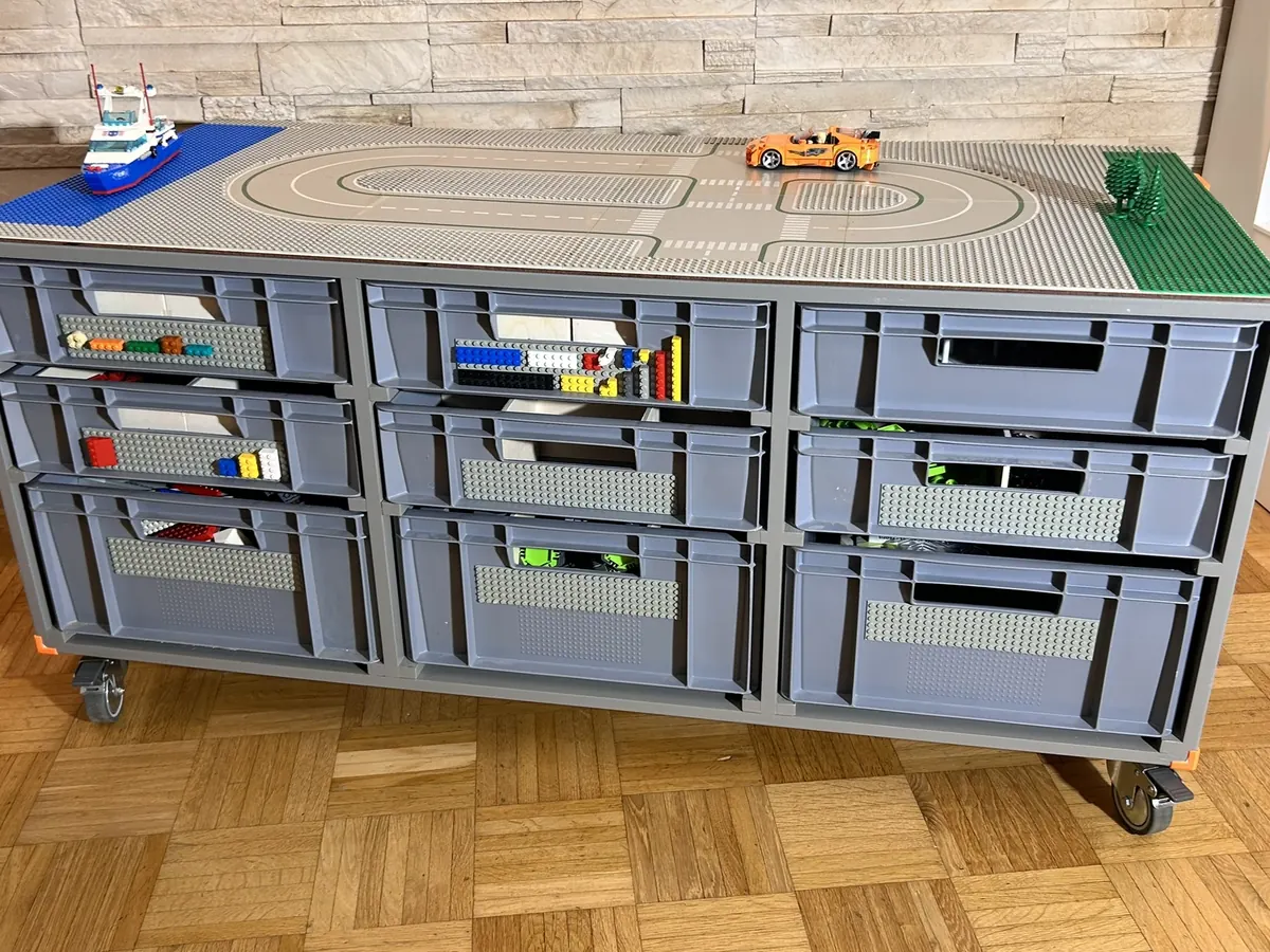 RACK PLAY play table with wooden railway top and 9 Euro containers
