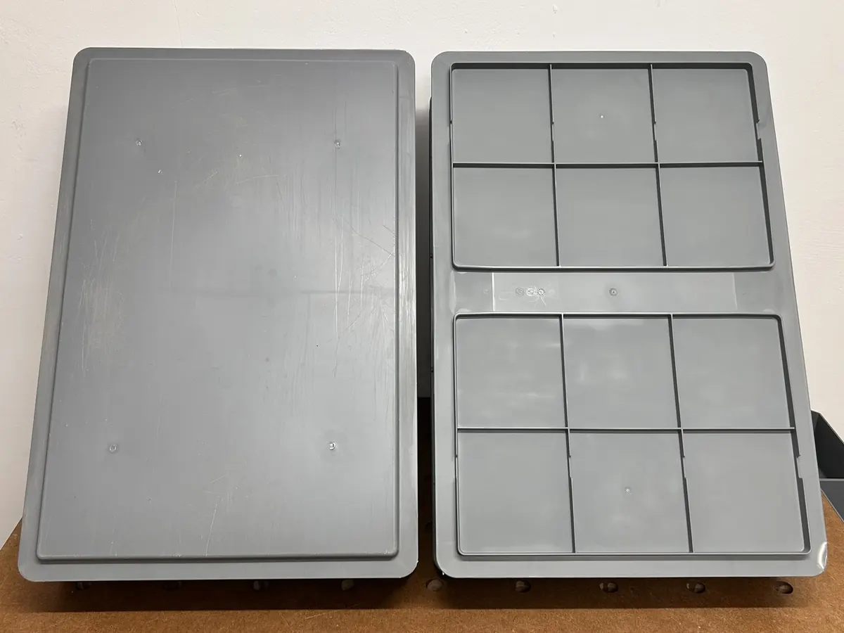 Undersides compared: smooth reinforced base and ribbed standard base