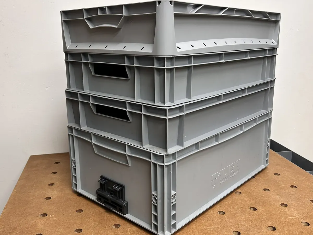 Mixed stack of OBI, Bauhaus and Auer containers